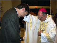 Eric Scheidler blessed by Bishop Sartain