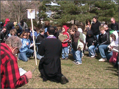 Fr. Cesar Pajarillo leads the Stations of the Cross in Aurora April 10