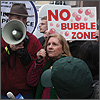 Ann Scheidler addresses the media at a protest of Chicago's new bubble zone