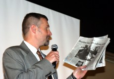Eric Scheidler with newspaper