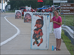 Pro-lifers hold Baby Malachi signs on Perryville Road