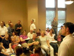 Crowd inside library board meeting