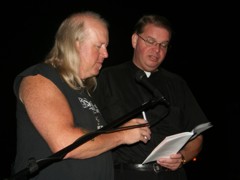 Father Fred and Randy Schoof lead prayer