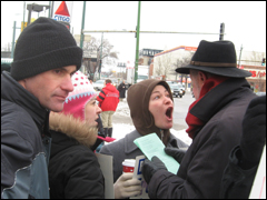 Carolers outside of Planned Parenthood Aurora