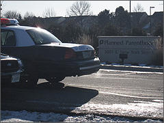 Police cars outside Planned Parenthood Aurora