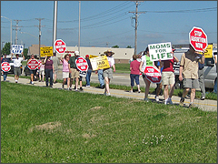 Protesters line New York Street outside Planned Parenthood Aurora on June 20, 2009