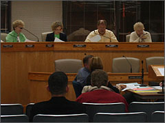 Eric Scheidler and Peter Breen observe the 9/30 Planning Commission meeting