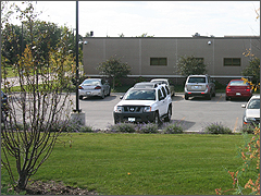 Planned Parenthood Aurora's staff parking lot with 5 empty spaces