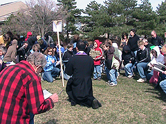 Pro-lifers pray the stations of the cross at Planned Parenthood Aurora