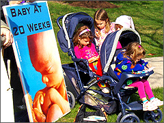 Children praying for an end to abortion [Photo by Dan Gura]