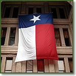 Texas flag outside the Capitol in Austin