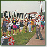 Joe Scheidler leads a protest of President Bill Clinton