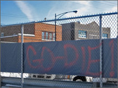 Graffiti on abortuary fence reads 