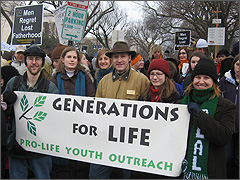 (Left to Right) John Jansen, Eleanore Strong, Eric Scheidler, Liza Scheidler and Corrina Gura march behind the GFL banner [Photo by Matt Yonke]