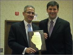 Peter Breen of the Thomas More Society presents David Bereit with the 2011 Henry Hyde Life Leadership Award [Photo by Ann Scheidler]