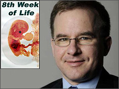 Neil Steinberg pictured beside the eight week old unborn baby he believes is merely "a dot."