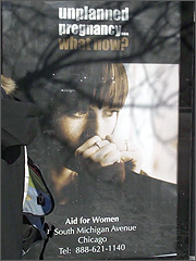 The new Aid For Women ad outside of the Planned Parenthood clinic on LaSalle and Division