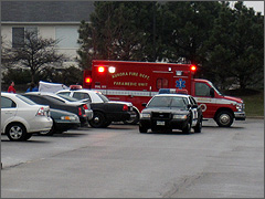 Ambulance and police cars at Planned Parenthood Aurora