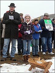 Christmas caroling outside Albany abortion clinic in Aurora