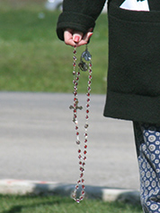 Rosary in hand