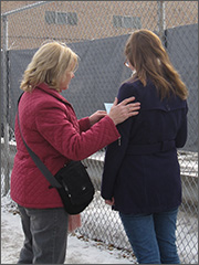 Sidewalk counselor and woman outside Chicago abortion clinic
